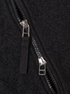 Close-up of the Black Wool Fleece Zip Waistcoat, showcasing the texture of the black wool fleece and the zipper detail. The image is tightly cropped.