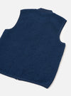 Rear view of the Indigo Wool Fleece Zip Waistcoat presented against a plain white background. The back section highlights the soft indigo blue wool fleece texture, clean hemline, and simple sleeveless construction.