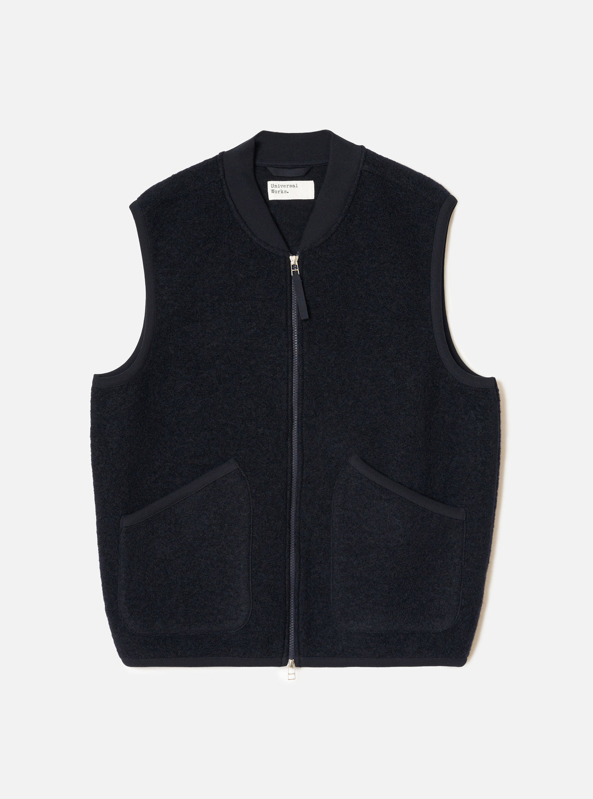 Front view of the Navy Wool Fleece Zip Waistcoat displayed flat against a plain white background. The dark navy wool fleece fabric, full front zipper, V-neckline, and two lower patch pockets are clearly visible.