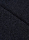 Extreme close-up fabric swatch image showcasing the texture of the Navy Wool Fleece Zip Waistcoat. The detailed shot highlights the rich navy blue tone, soft fibers, and cozy tactile feel of the wool fleece material.