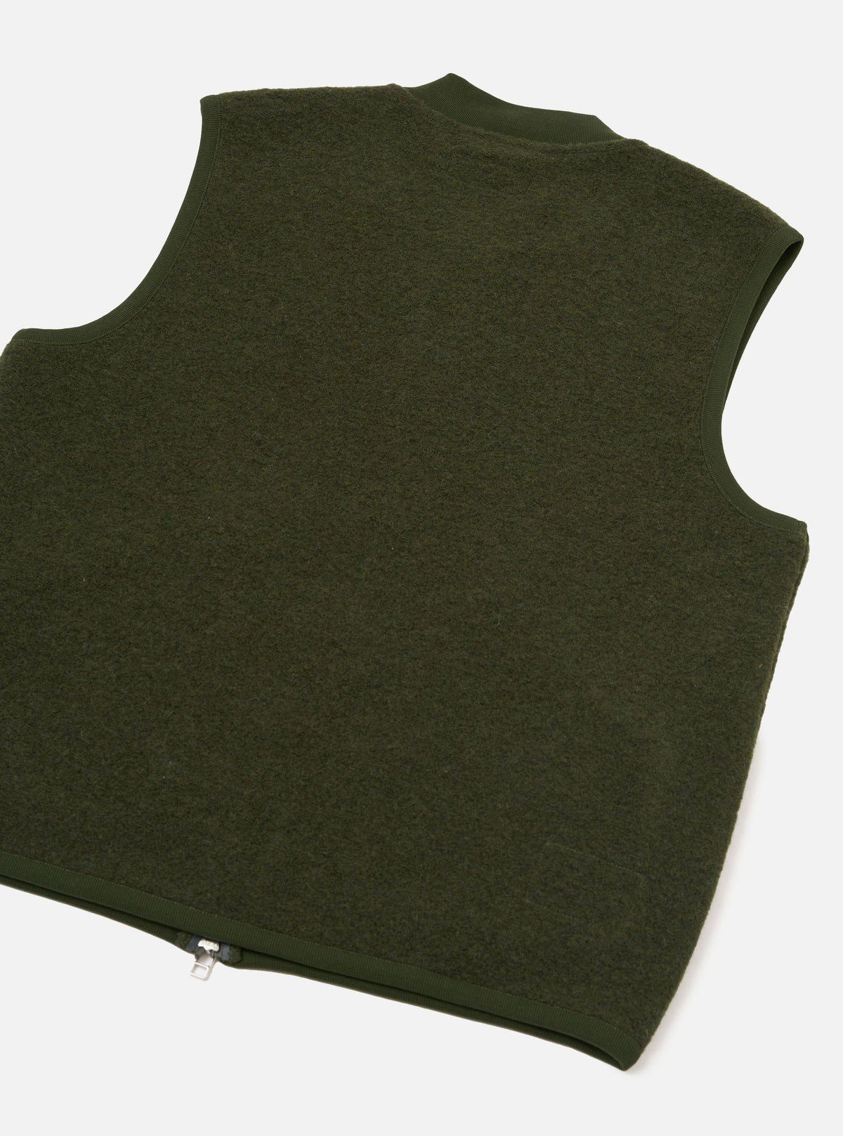 Rear view of the Olive Wool Fleece Zip Waistcoat presented against a plain white background. The back section highlights the soft olive green wool fleece texture, clean hemline, and simple sleeveless construction.