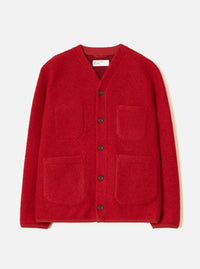 Scarlet wool fleece cardigan laid flat on a white studio backdrop. Collarless V-neckline with a Universal Works label visible at the neck. Five dark buttons down the centre front. Two chest patch pockets and two larger lower patch pockets in matching fleece. Plain cuffs and a straight hem. Textured boiled wool fleece fabric throughout.