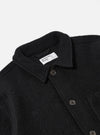 Close-up of the Black Wool Fleece Field Jacket on a white background. The jacket features a button-up design and a classic collar.