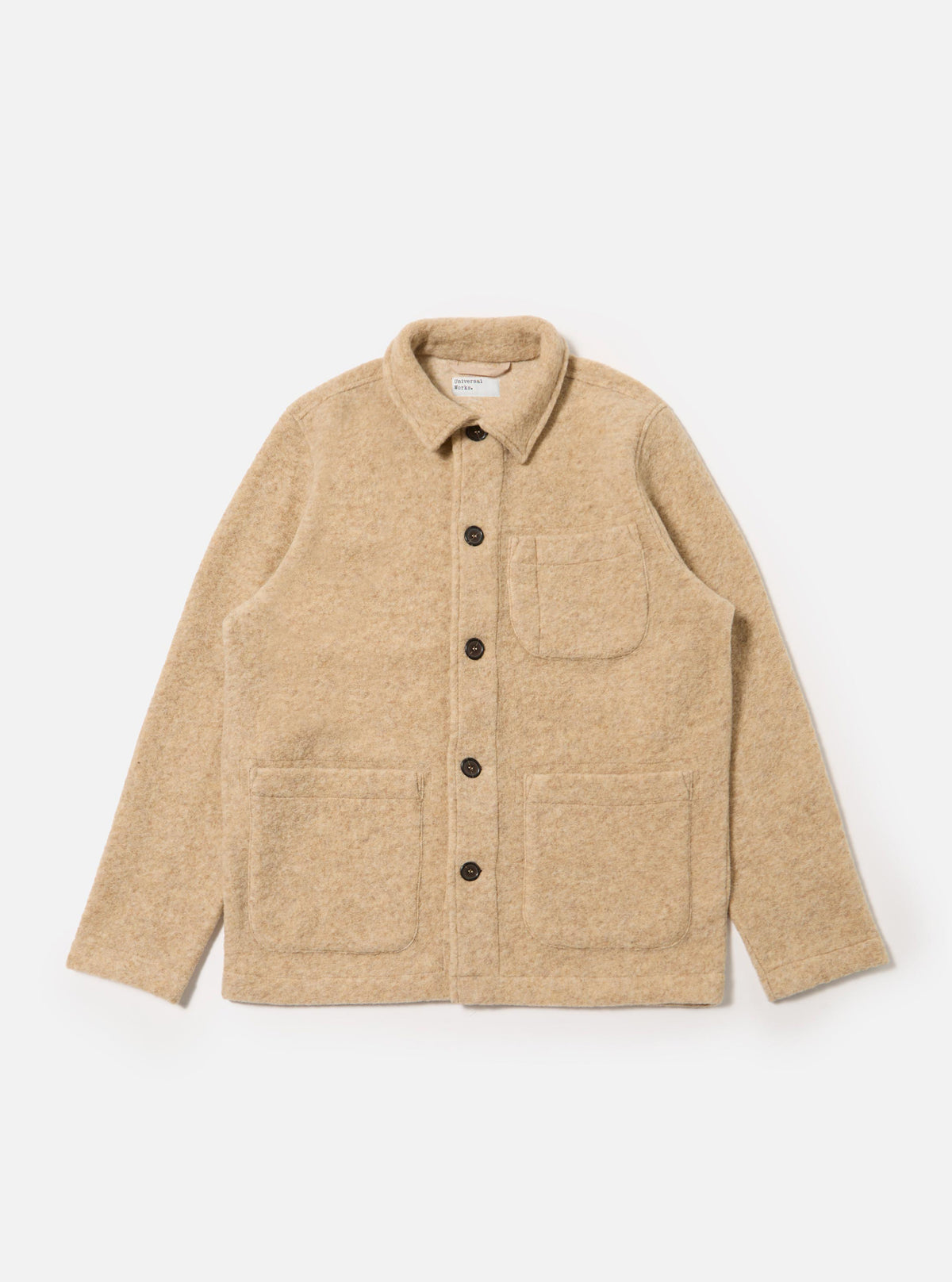 The Fawn Wool Fleece Field Jacket is displayed on a white background. The jacket is a light tan color and has a relaxed fit with button closure and patch pockets.