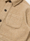 Close-up of the Fawn Wool Fleece Field Jacket, showing the soft texture, button details, and pocket. Shot on a white background.