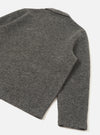 Rear view of the Grey Marl Wool Fleece Field Jacket shown against a solid white background. The clean back construction highlights the textured grey marl wool fleece fabric, classic hem, and long sleeve design.