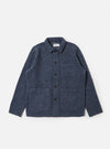 The slate blue wool fleece field jacket is laid flat on a white background. The jacket has a button up front and two large pockets.