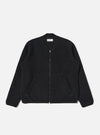 The Black Wool Fleece Zip Bomber is displayed on a white background. The bomber is black, made of wool fleece, and has a zip closure. It features a classic fit.