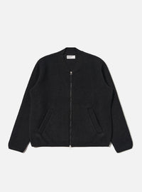 The Black Wool Fleece Zip Bomber is displayed on a white background. The bomber is black, made of wool fleece, and has a zip closure. It features a classic fit.