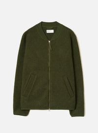 Olive wool fleece zip bomber, flat lay on a light grey seamless backdrop. Features a ribbed bomber collar, full-length silver zip with a fabric puller, and two welt hand pockets at the hem. The textured boiled wool fleece body contrasts with smoother ribbed cuffs and hem. A Universal Works woven label is visible at the neck.