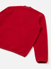 Scarlet wool fleece zip bomber shot flat on a white studio surface, angled to show the back and one sleeve. The boiled wool texture is visible across the body. A tonal satin ribbon trims the crew neckline, hem and cuff. No zip or collar visible from this angle.