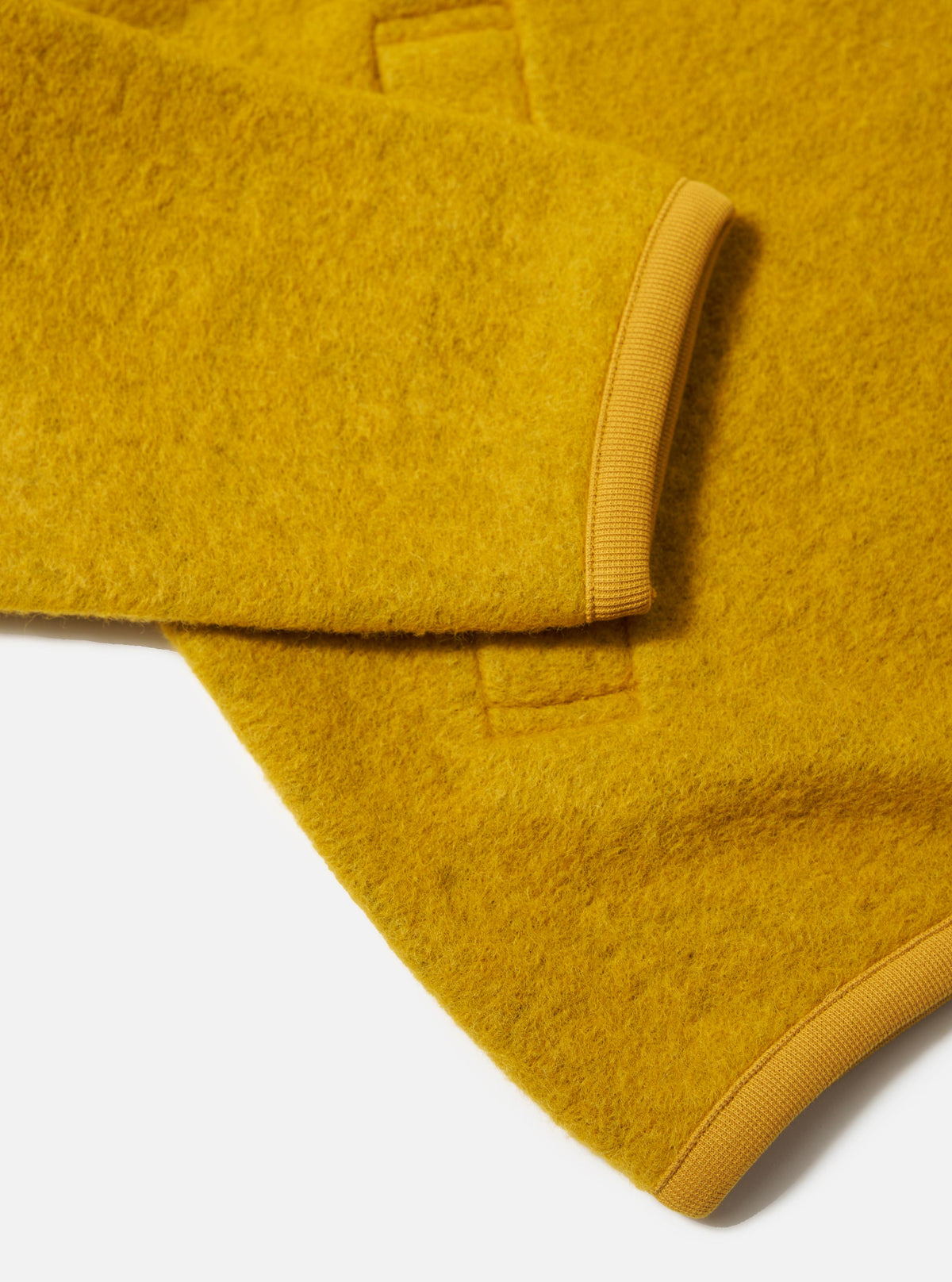 Close-up of the Yellow Wool Fleece Zip Bomber showing the texture and trim. The background is a clean, bright white.