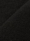 Extreme close-up fabric swatch image showcasing the texture of the Black Wool Fleece Zip Liner Jacket. The detailed shot highlights the deep black tone, soft fibers, and cozy tactile feel of the wool fleece material.