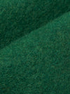 Close-up of the Green Wool Fleece Zip Liner Jacket material. The soft, green wool fleece is neatly folded to showcase its texture and quality.