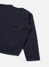 Rear view of the Navy Wool Fleece Zip Liner Jacket presented flat against a white backdrop. The shot showcases the clean back construction, navy blue wool fleece texture, and neatly edged sleeve cuffs and hem.