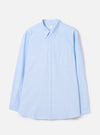 Front view of the Sky Blue Oxford Daybrook Shirt displayed flat against a plain white background. Features a classic button-down collar, chest pocket, full button placket, and light sky blue organic cotton oxford structure.