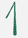 The Forest Green Bold Dot Print Rayon Tie is shown as a flat lay against a plain white background. The tie features a deep forest green base color with an all-over print of large, off-center white dots. The fabric has a smooth, slightly lustrous appearance characteristic of rayon.