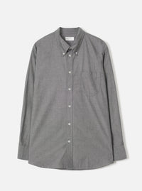 Front view of the Black Prince Chambray Daybrook Shirt laid flat against a plain white background. Highlights the black textured chambray cotton fabric, classic collar, button-up front, and single chest pocket.