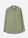Front view of the Olive Prince Chambray Daybrook Shirt laid flat on a light grey backdrop. Features a spread collar, button-front placket, a single patch pocket on the left chest, and long sleeves with buttoned cuffs. No model or mannequin present.