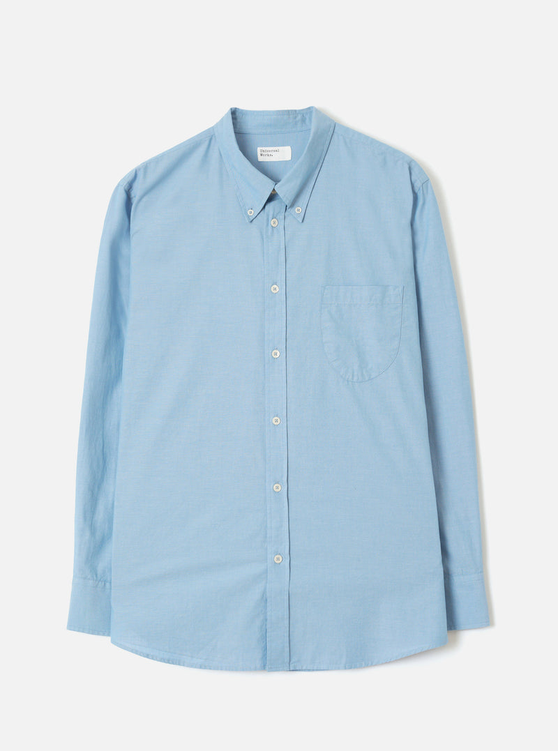 Front view of the Sky Blue Prince Chambray Daybrook Shirt laid flat on a plain white studio backdrop. The shirt features a spread collar, full button placket with light buttons, and a single chest patch pocket. No model or mannequin present.