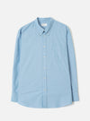 Front view of the Sky Blue Prince Chambray Daybrook Shirt laid flat on a plain white studio backdrop. The shirt features a spread collar, full button placket with light buttons, and a single chest patch pocket. No model or mannequin present.
