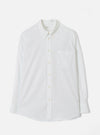 Front view of the White Prince Chambray Daybrook Shirt displayed flat against a clean white studio background. The light cotton chambray fabric, button-down collar, chest pocket, and full front button closure are prominently featured.