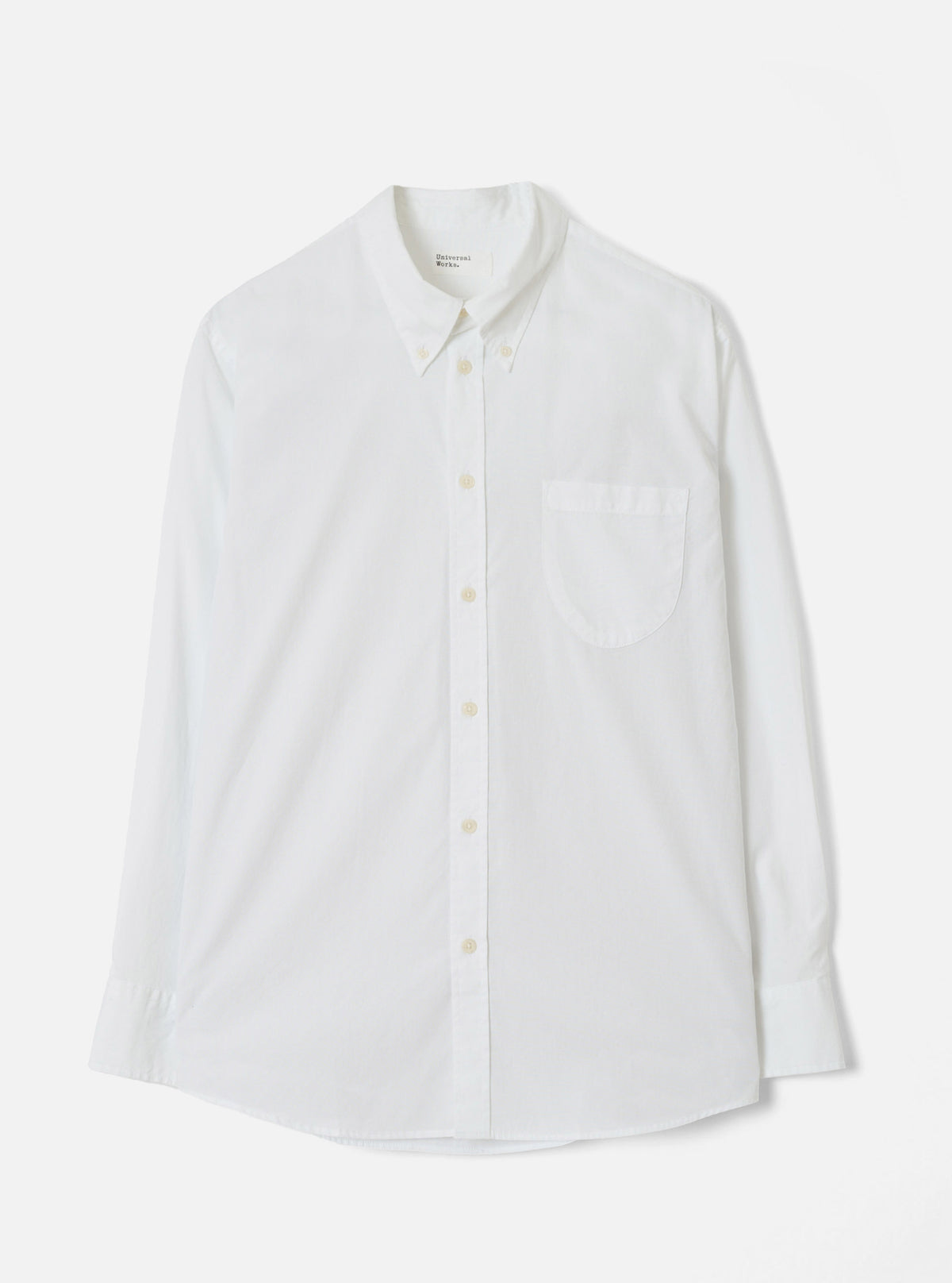 Front view of the White Prince Chambray Daybrook Shirt displayed flat against a clean white studio background. The light cotton chambray fabric, button-down collar, chest pocket, and full front button closure are prominently featured.