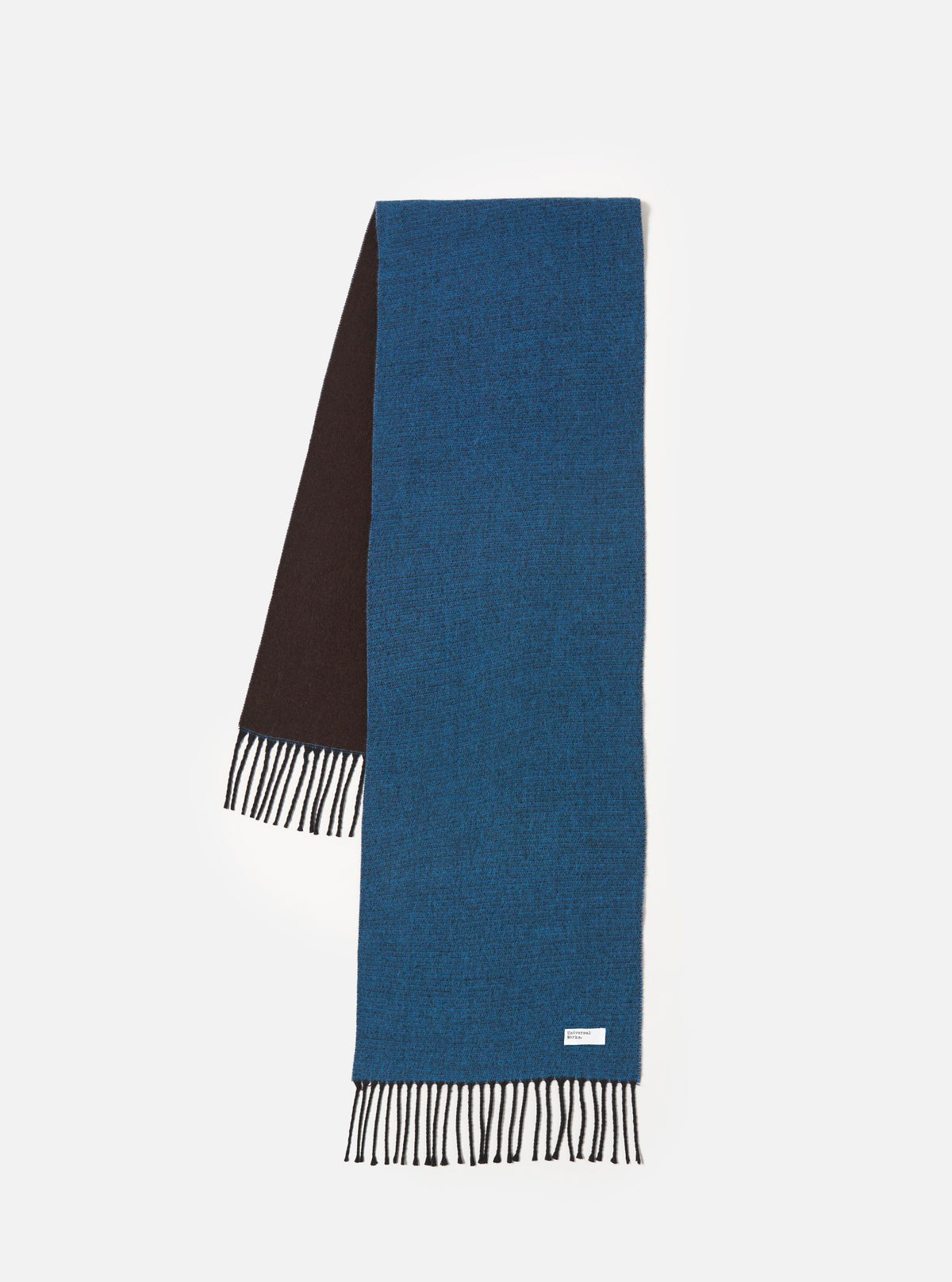 Front view of the Light Blue/Brown Double Sided Scarf laid flat against a plain white background. The image displays the dual-sided design featuring light blue on one side and warm brown on the other, complete with fringed ends.
