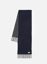 Front view of the Navy/Mid Grey Double Sided Scarf displayed flat on a plain white background. The image highlights the reversible design with navy blue on one face and mid-grey on the opposite side, along with fringed ends.