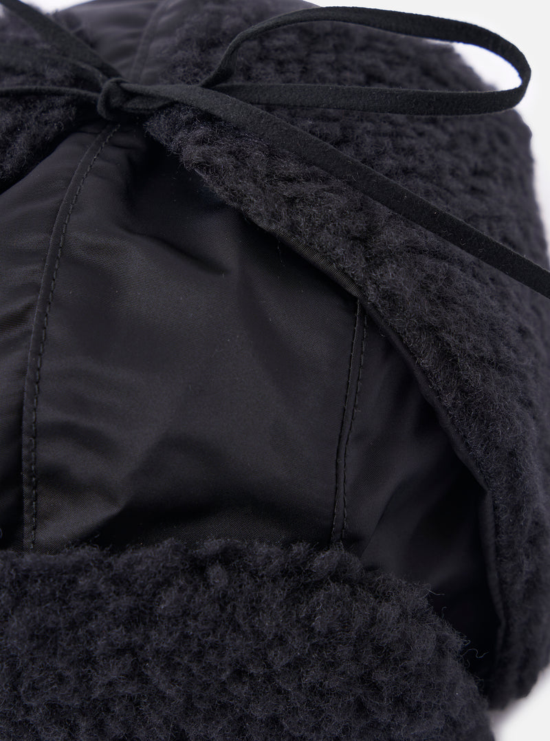 Close-up of the cableami® Black Military Nylon Twill Boa Aviator hat, showing the black nylon and boa textures. The hat is on a white background.