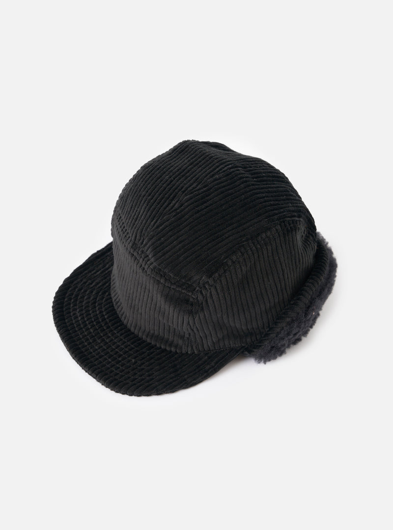 cableami® Black Corduroy 5w Cap on a white surface. The cap is made of black corduroy material and has a classic fit. The background is clean and minimal.