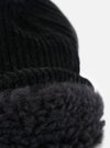 Close-up of the cableami® Black Corduroy 5w Cap showing the corduroy texture and soft lining against a white background.