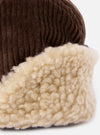 Close-up of the cableami® Brown Corduroy 5w Cap, showcasing the brown corduroy texture and cream-colored faux fur trim. Shot against a clean white background.