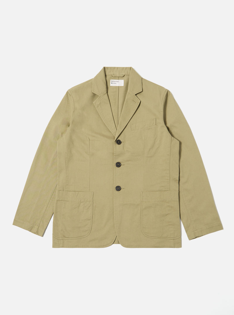The Sand Twill London Jacket in a light sand color, made of twill fabric, is laid flat on a white background. It features a classic fit with button closure and patch pockets.