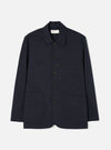 Front view of the Navy Twill Bakers Chore Jacket presented flat against a plain white background. Shows five button closures, chest patch pocket, and two front waist pockets in dark navy blue twill fabric.