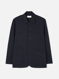 Front view of the Navy Twill Bakers Chore Jacket presented flat against a plain white background. Shows five button closures, chest patch pocket, and two front waist pockets in dark navy blue twill fabric.