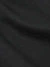 Close-up of the Black Twill Curved Pant, showing the fabric's texture and drape. The twill weave is visible, creating a subtle pattern. 
