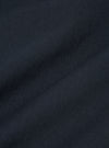 Close-up of the Navy Twill Military Chino fabric. The dark blue twill weave is clearly visible, showing the texture and quality of the material.