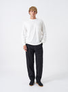 Front view of a male model wearing the Black Twill Fatigue Pant on a neutral studio background. Highlights the relaxed straight-leg fit, military-inspired front patch pockets, and casual drape of the black twill trousers.