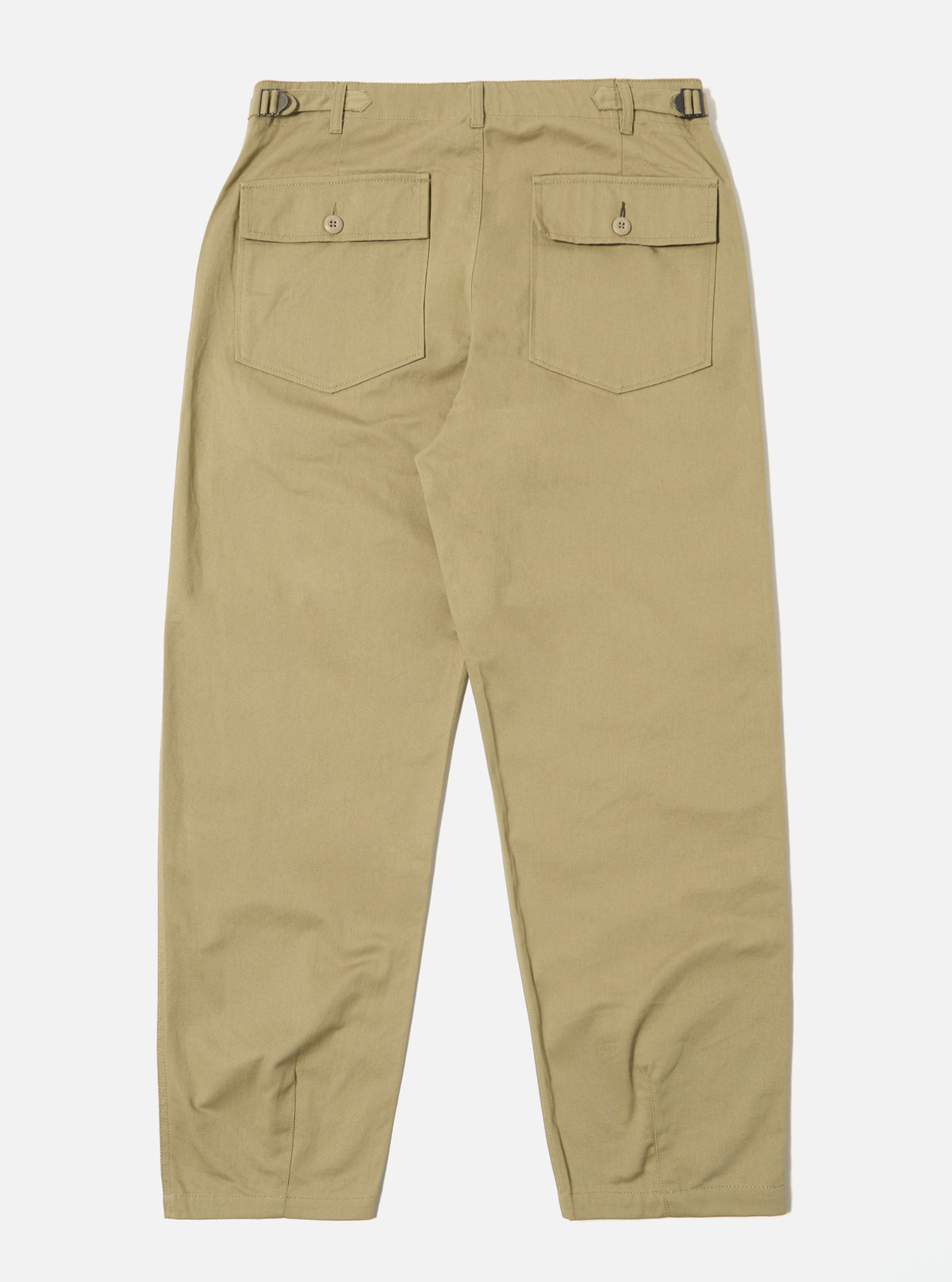 Back view of the Sand Twill Fatigue Pant on a white background. The pants are a relaxed fit and made of a durable twill fabric.