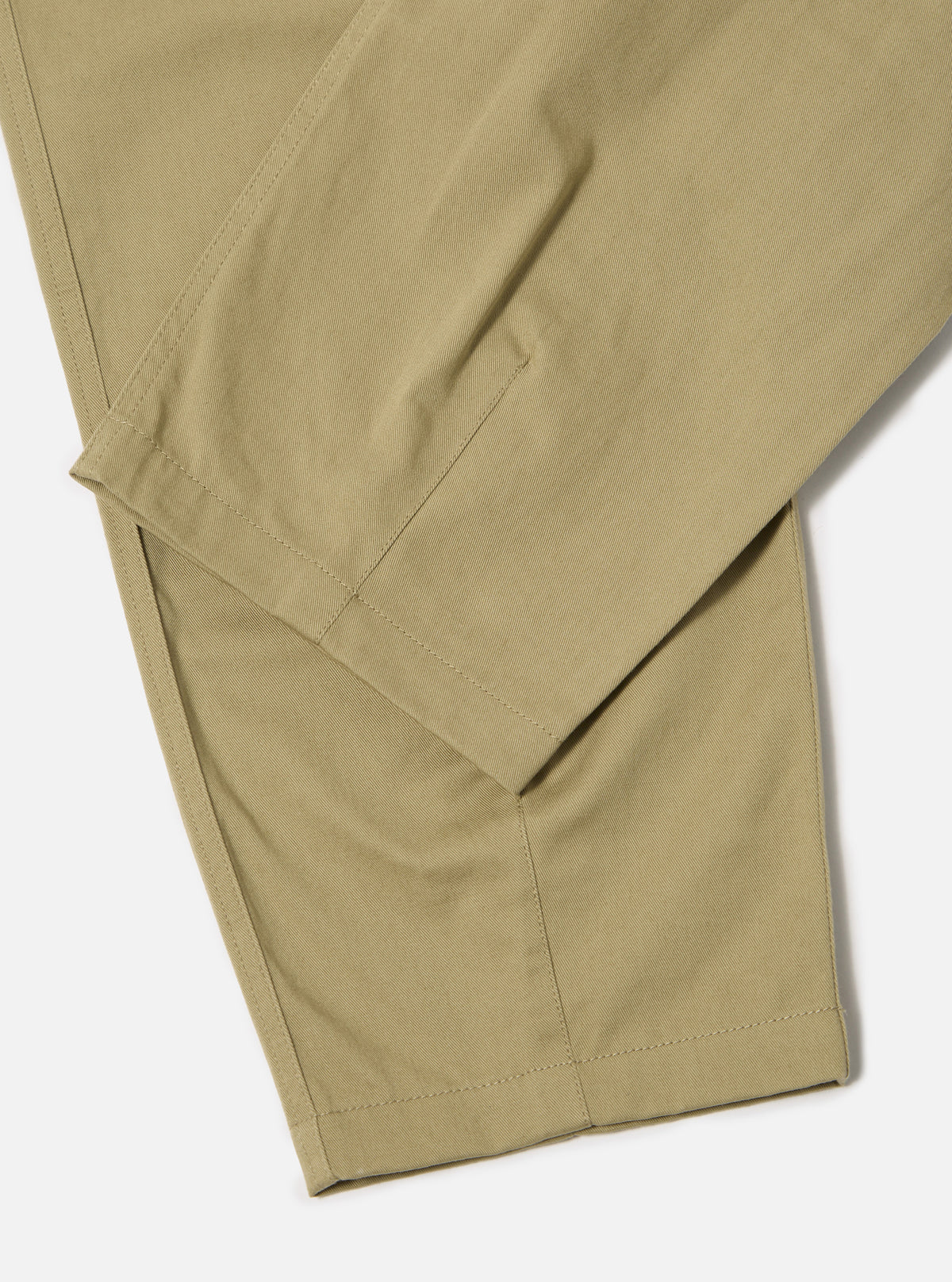 Close-up of the sand twill Fatigue Pant on a white background. The durable twill fabric and tailored fit are highlighted.
