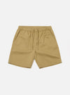 The Sand Twill Beach Short is presented as a flat lay against a solid white background. These light beige shorts feature an elasticated waistband with an internal drawstring and two large patch pockets on the front. The cotton twill fabric has a visible diagonal weave.