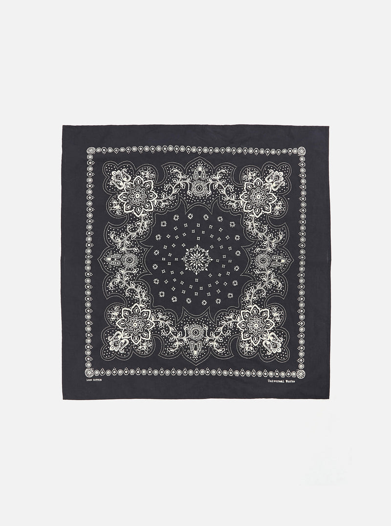 Flat lay of a Black Classic Bandana Neckerchief on a white background. The bandana has a white floral pattern.