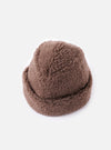 Close-up of the cableami® Brown Toque Boa Cap on a white background. The hat is a soft, brown boa material with a classic toque shape.