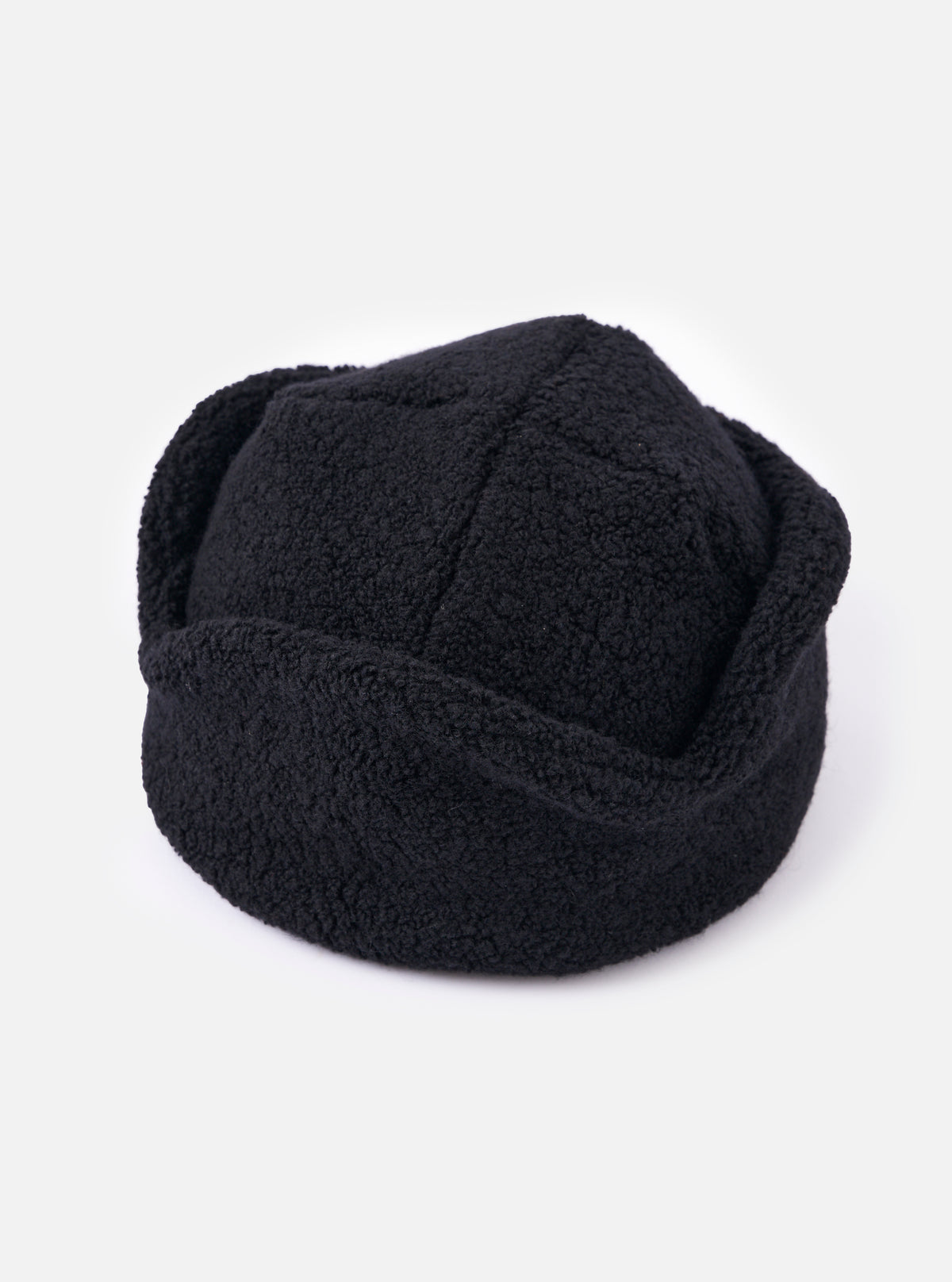 Close-up of the cableami® Black Recycled Wool Flight Watch Cap on a white background. The cap is made of a textured, recycled wool material and has a classic flight watch cap design.