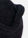 Close-up of the cableami® Black Recycled Wool Flight Watch Cap, showing the texture of the wool. The cap is on a white background.