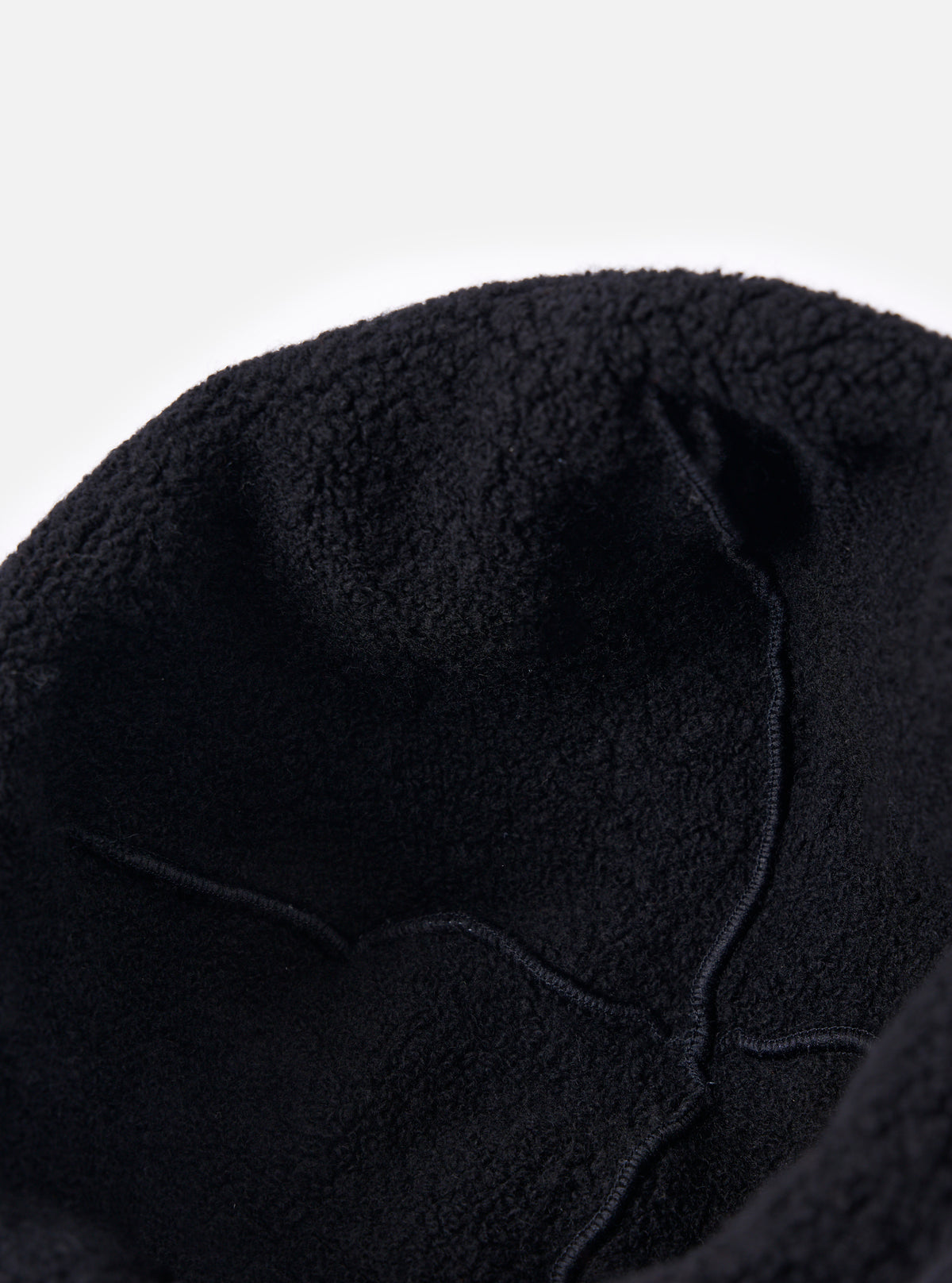 Close-up of the cableami® Black Recycled Wool Flight Watch Cap on a white background. Shows the texture and construction of the cap.