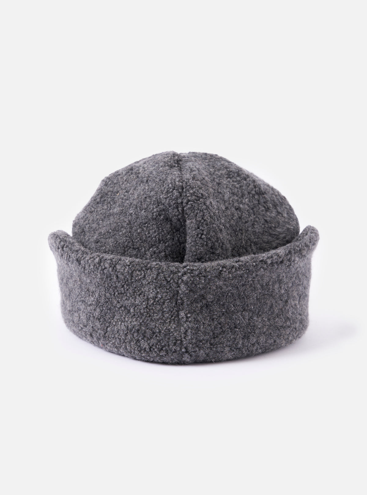 Close-up of the cableami® Grey Recycled Wool Flight Watch Cap on a white background. The cap is a textured grey wool with a rounded top and a brim that folds up.