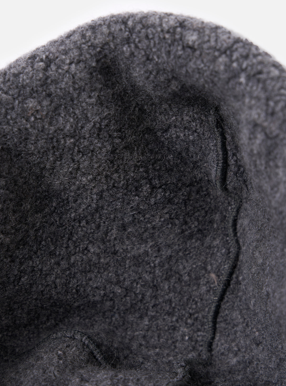 Close-up of the cableami® Grey Recycled Wool Flight Watch Cap, showing the texture of the wool. The image is shot against a white background.