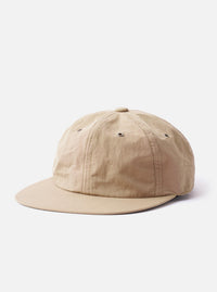 The cableami Beige/Olive Cotton/Nylon B.B Cap is shown as a flat lay against a plain white background. The cap features a classic six-panel construction with a beige crown and a contrasting olive green curved brim. A small, circular ventilation eyelet is visible on the side panel, and the top is finished with a matching beige button.